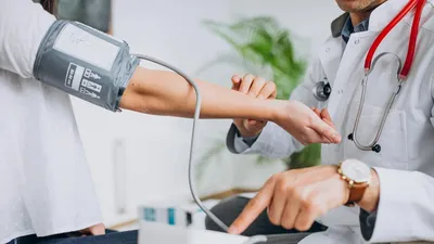 New treatment for high blood pressure control with a small ear clip