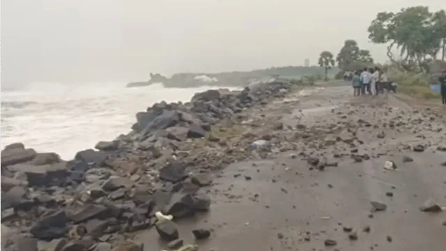 Cyclone Arnab Sea turns violent at Uppada coast as boulders hit road
