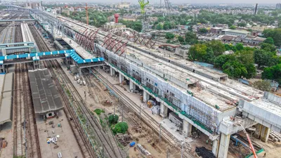 Bullet Train above and regular trains below Ahmedabad railway marvel