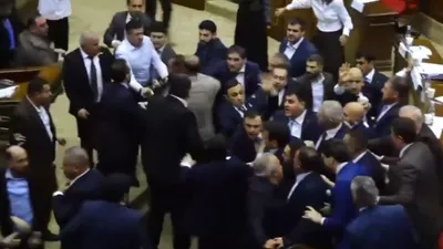 Armenia Parliament MPs brawl as Speaker keeps live broadcast running for public to see